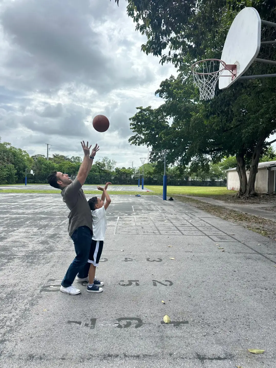 Benjamin Bersson, BCBA, playing basketball, staying active outside the clinic in South Florida