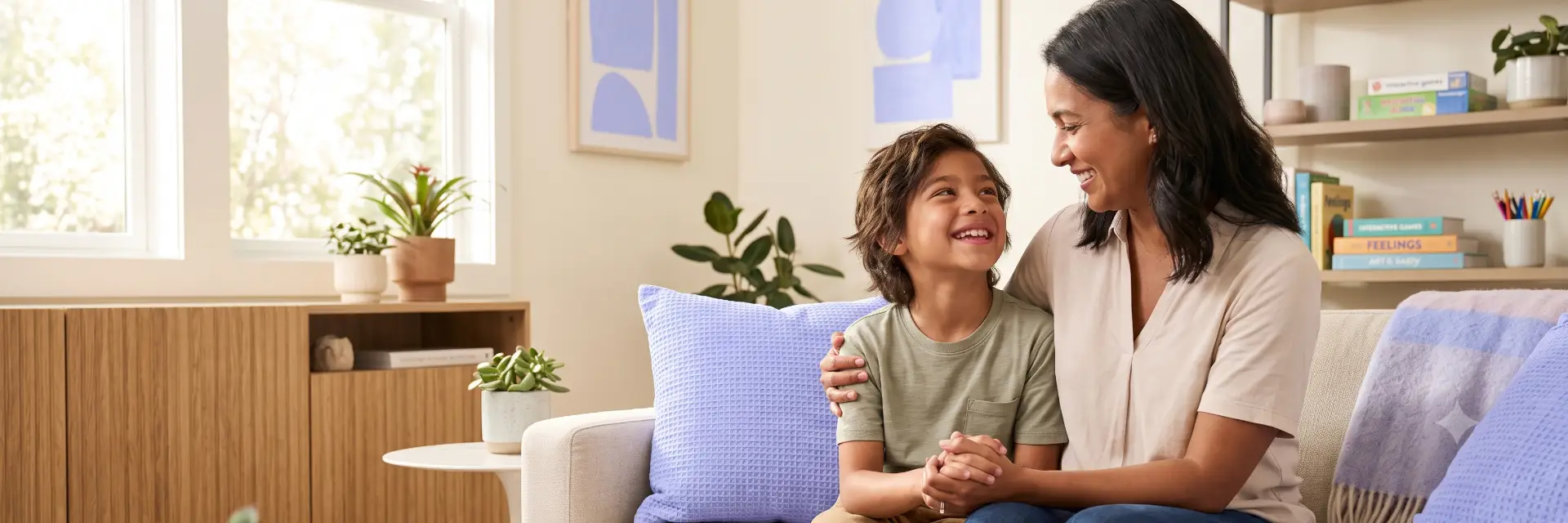 CCDB Individual Counseling - mother and son smiling together during a counseling conversation